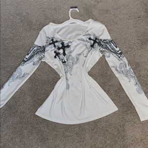 Elegant White Long Sleeve Top with Graphic Design